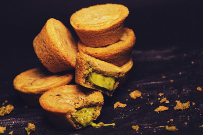 Close-up of bread against black background