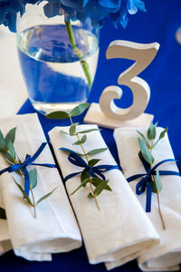 Wedding blue decorations on the table and lavender