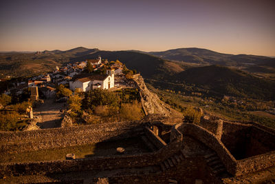 High angle view of townscape against sky during sunset