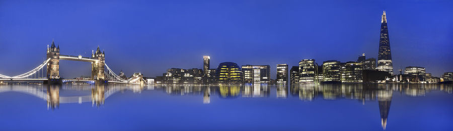 Reflection of illuminated buildings in water