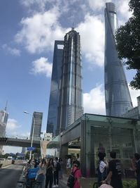 Low angle view of modern buildings against sky