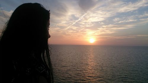 Scenic view of sea at sunset