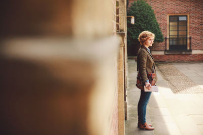 Full length of woman standing outdoors