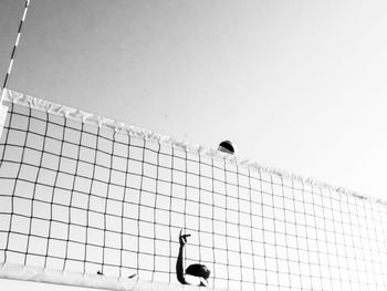 Low angle view of ceiling against clear sky