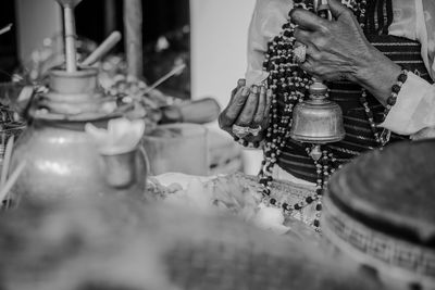 Close-up of person hand on table