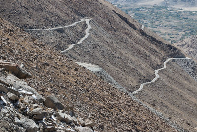 High angle view of surf on road