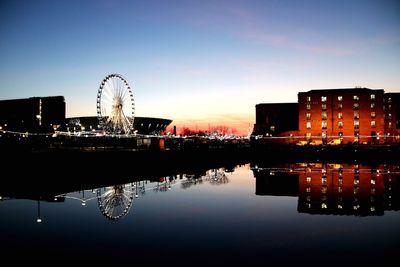 Reflection of illuminated buildings in water