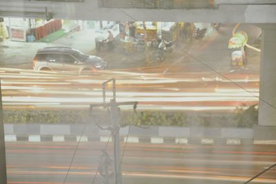 Reflection of city on glass window