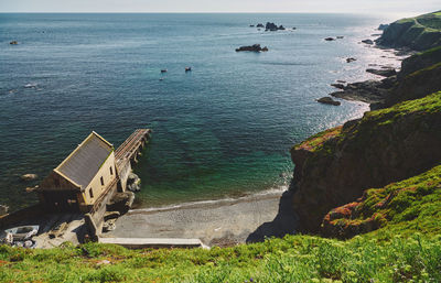 High angle view of beach against sky at lizard point in cornwall, england