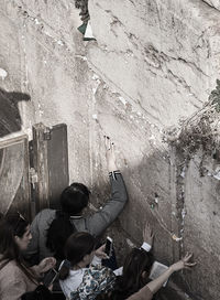 High angle view of people on wall