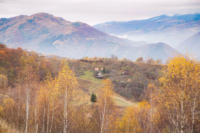 Scenic view of landscape against sky during autumn