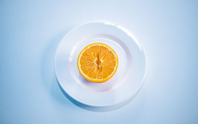 High angle view of orange fruit on table