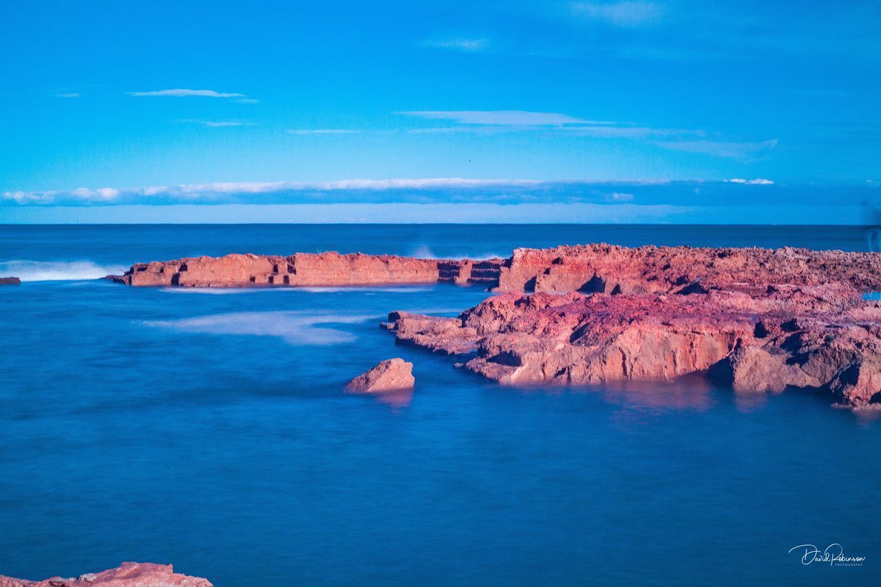 SCENIC VIEW OF SEA AGAINST BLUE SKY