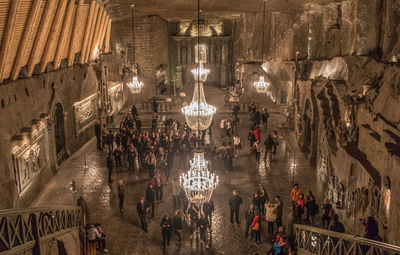 Group of people in illuminated building