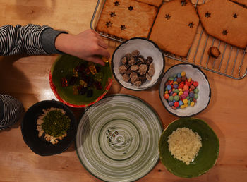High angle view of person preparing food on table