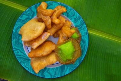 High angle view of vegetables in plate on table