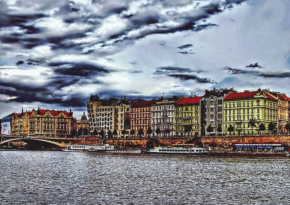 architecture, building exterior, built structure, sky, water, cloud - sky, cloudy, waterfront, city, residential building, river, building, residential structure, weather, cloud, overcast, day, outdoors, residential district, no people