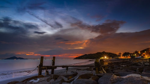 Scenic view of sea against sky at sunset