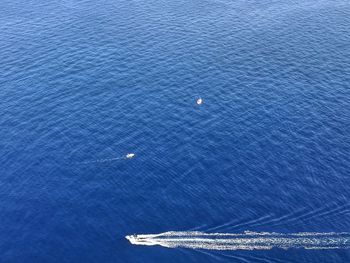 Close-up of sea against blue sky