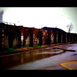 Road along buildings in city