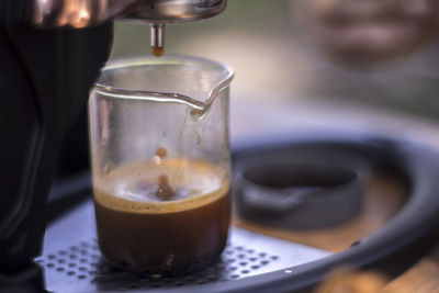 Close-up of coffee cup on table