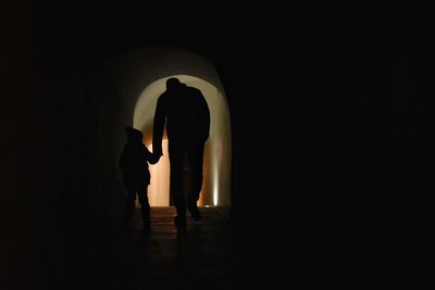 Silhouette woman standing in building