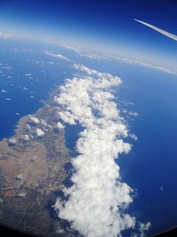 Aerial view of vapor trails in sky