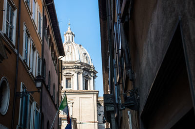 Low angle view of buildings against clear sky