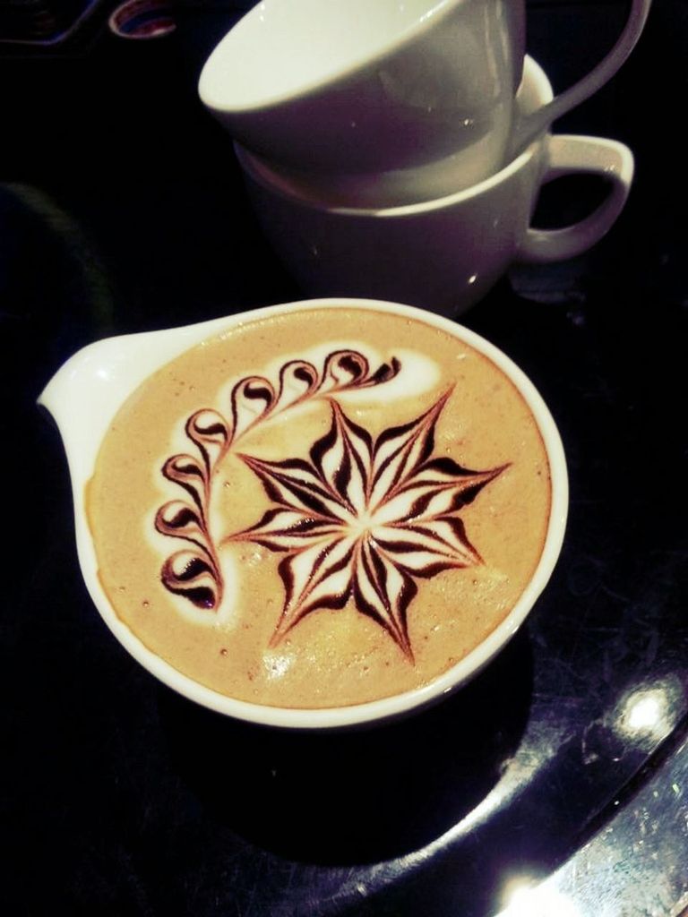 food and drink, indoors, table, still life, coffee cup, freshness, saucer, drink, high angle view, close-up, creativity, coffee - drink, refreshment, art, frothy drink, cappuccino, froth art, cup, coffee, heart shape