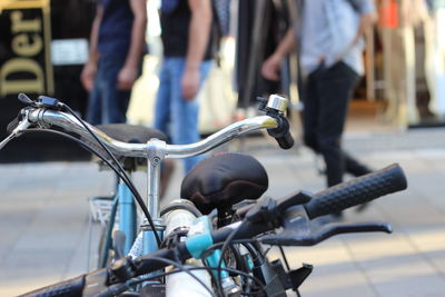 Close-up of bicycle on street