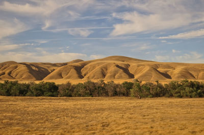 Scenic view of desert against sky