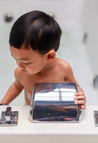 Portrait of boy looking at camera