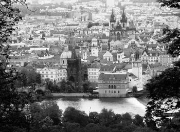 High angle view of charles bridge over vltava river in city