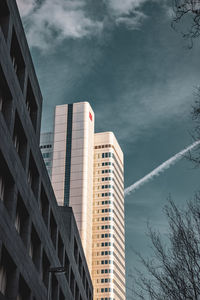 Low angle view of buildings against sky in city