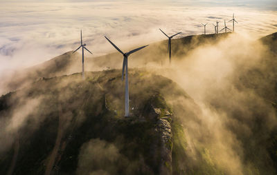 High angle view of wind turbines on land