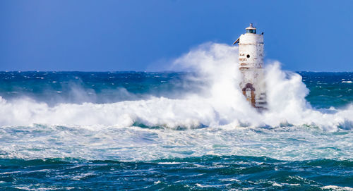 Scenic view of sea against clear sky