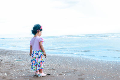 Little girl by the beach