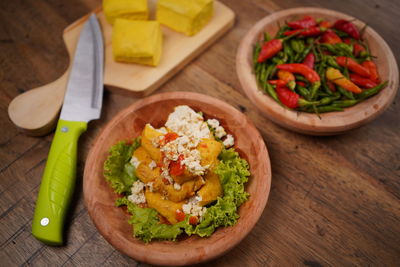 High angle view of salad served on table