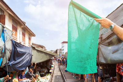 Clothes drying on clothesline against sky