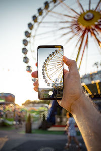 Man photographing through smart phone