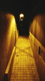 Empty walkway at night