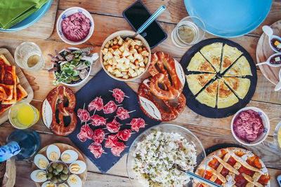 Evening dinner on the terrace. summer aperitif with friends view from the top  table with many foods