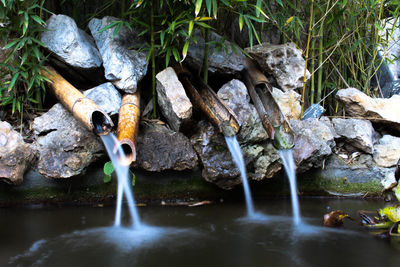 Close-up of waterfall amidst rocks