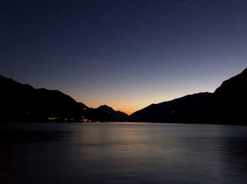 Scenic view of sea against clear sky during sunset