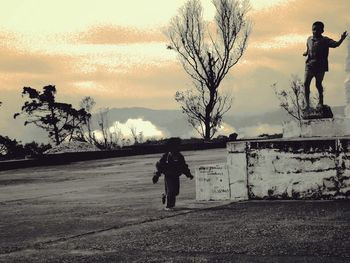 Silhouette of woman against clear sky