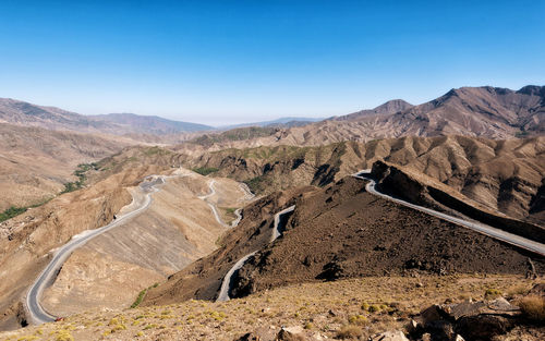 Scenic view of landscape and mountains against sky