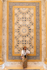 Low section of woman standing on floor