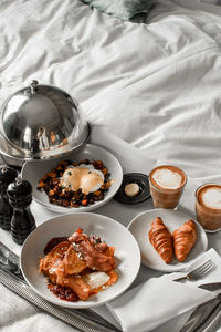 High angle view of breakfast on bed at home