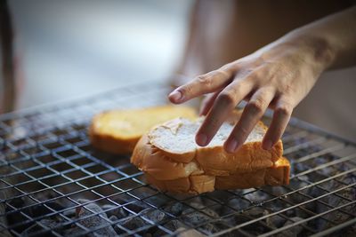 Close-up of person preparing food