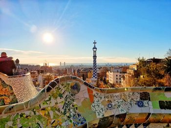 High angle view of city buildings against sky during sunset